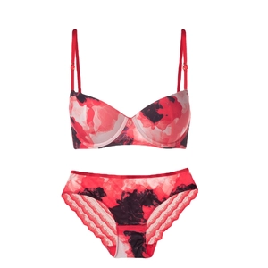 Red floral print lingerie set with lace trim bra and matching panties on white background