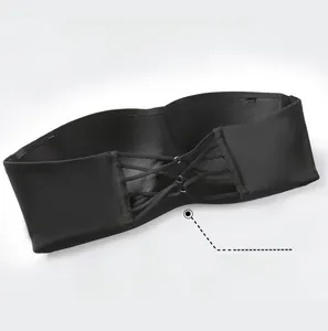 Close-up of black strapless bra with elastic multi-strap crisscross back detail
