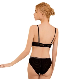 Lace push-up bra and panty set in black mesh with adjustable straps and striped waist