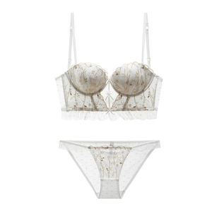 Set lingerie in pizzo bianco con ricami floreali a contrasto e reggiseno stile longline