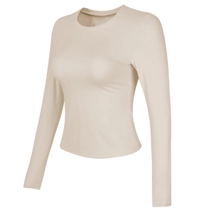 Top da yoga beige a maniche lunghe con taglio aderente per la corsa professionale