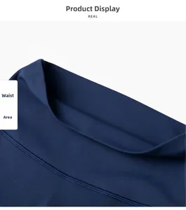 Detalle de mallas de yoga azul oscuro con cintura elástica alta y costuras planas de precisión