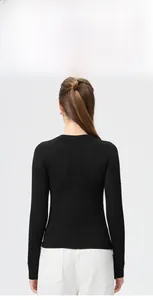 Detail of 3D textured back on black high-stretch compression yoga top for body sculpting