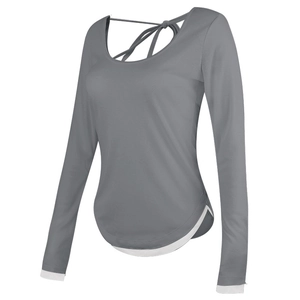 Grey long sleeve yoga top with open back cross straps and white contrast trim detailing