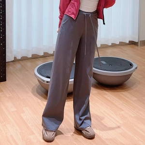 Women's high-waisted wide-leg athletic pants in charcoal grey for fitness and pilates