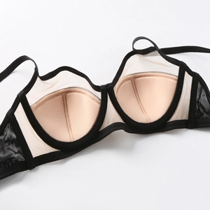 Lace bra with sheer mesh and skin-tone padding featuring breathable black mesh stitch detail