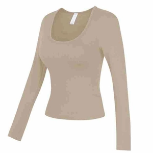 Haut de yoga beige à manches longues col en U avec coussinets de poitrine