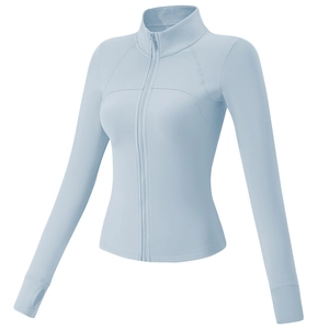Veste de sport femme bleu clair ajustée avec col montant et passe-pouces pour le fitness