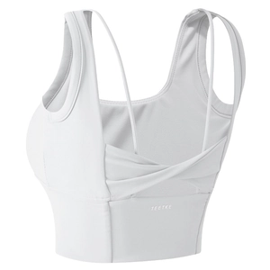 Brassière de sport blanche avec larges bretelles et dos croisé torsadé unique