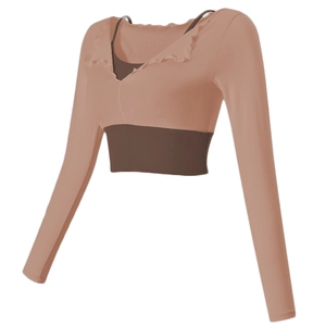 Slim fit two-piece yoga top with built-in chest pads and elegant ruffled v-neckline