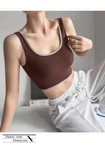Detail view of contrast trim on a chocolate brown high-impact sports yoga bra