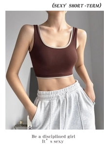 Close-up of high-support sports bra with dark brown and cream contrast color trim