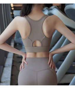 High-impact sports bra and leggings set with taupe racerback and cutout detail
