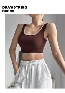Detail of high-impact sports bra with contrast trim and drawstring yoga pants set