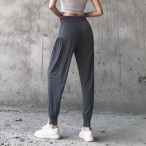 Women's dark gray high-waisted jogger pants with elastic cuffs for yoga and casual wear