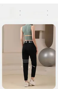 Pantalon de jogging noir coupe ajustée avec taille haute élastique et chevilles côtelées