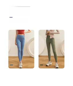 Detailed view of high-waisted yoga leggings in blue and green with heathered texture