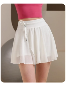 Detail of high-waisted white pleated tennis skirt with adjustable drawstring and inner liner