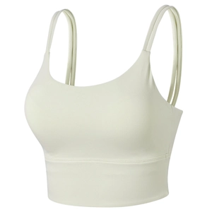 Women's light green sports bra with double spaghetti straps and a supportive wide hem