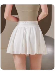 Detailed back view of a white high-waisted pleated tennis skirt with mesh overlay and lining