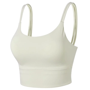 Minimalist seamless sports bra with thin double straps and wide support band in light green