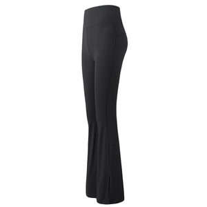 High waisted black flare yoga leggings with slimming tummy control and split hem detail