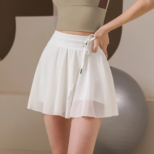 White high-waisted pleated tennis skirt with lightweight mesh layers and drawstring