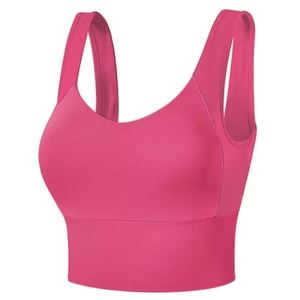 Deep pink women's sports bra with wide straps and U-neck for yoga and fitness