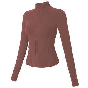 Veste de sport ajustée rouge brique pour femme avec passe-pouces et col montant