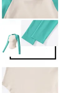 Detail view of raglan sleeves, curved hem, and stitching on the slim yoga shirt