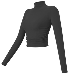 Close-up of black ribbed mock neck yoga top with stylish ruched side details
