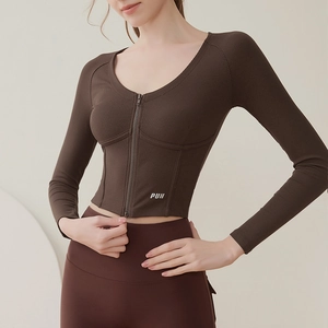 Slim fit dark brown yoga top with front zipper and vertical ribbed texture fabric