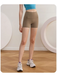 Détail du short de yoga marron sans couture à taille haute avec tissu élastique de soutien