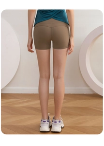 Vue arrière du short de yoga marron taille haute avec coutures galbantes fessiers