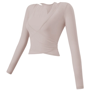 Slim fit wrap-around yoga top with long sleeves in soft pink breathable knit fabric