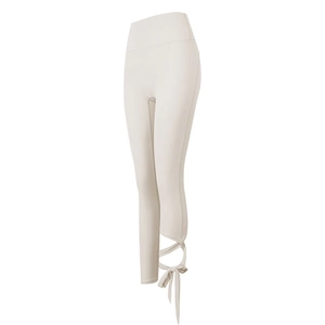 Leggings yoga a vita alta color crema con dettagli laterali incrociati e fiocchi