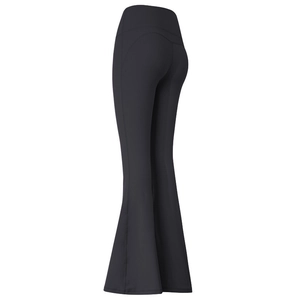 High-waisted black flare yoga pants featuring tummy control and a butt-lifting design