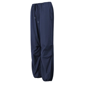 Close-up of deep blue cargo pants featuring adjustable drawstring waist and side pockets