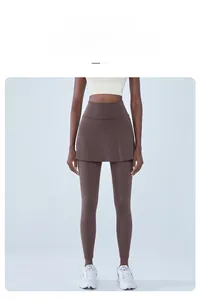 Détail de legging de yoga marron à taille haute avec jupe et coupe de compression