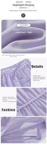 Detail view of purple sports shorts with drawstring waist and anti-exposure inner lining