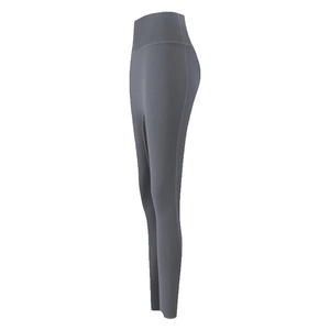 Detail view of high-waisted seamless scrunch yoga leggings in matte charcoal grey finish