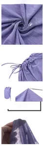 Detail of purple mesh yoga tank top showing side drawstring and anti-snag fabric texture