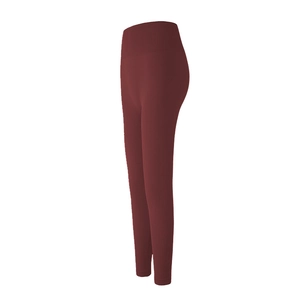 Vue détaillée de profil d'un legging de yoga bordeaux à taille haute et ceinture élastique