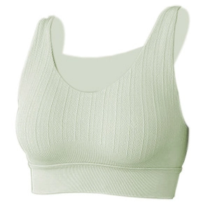 Light green ribbed cross back yoga sports bra with wide straps and elastic hem