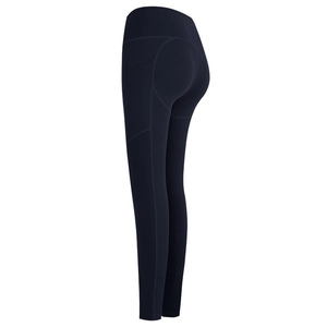 High-waisted navy blue yoga leggings with side pockets and peach butt lifting seams