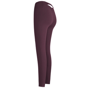 Deep purple high waisted yoga pants with criss-cross cutout and scrunch butt lifting effect