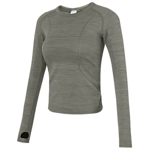 Detail view of seamless yoga top featuring functional thumbholes and olive gray texture