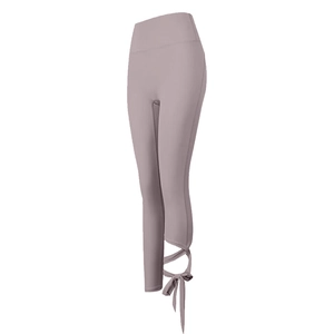 Pantaloni yoga viola chiaro a vita alta con design cavo e fiocchi decorativi alle caviglie