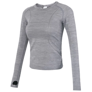 Detail of grey seamless yoga top featuring thumbholes and breathable knit texture