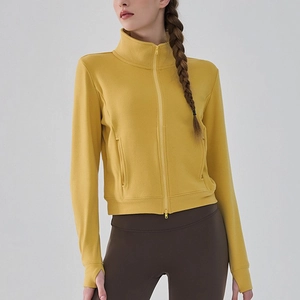 Veste de sport jaune moutarde pour femme avec col montant, passe-pouces et zip à double curseur